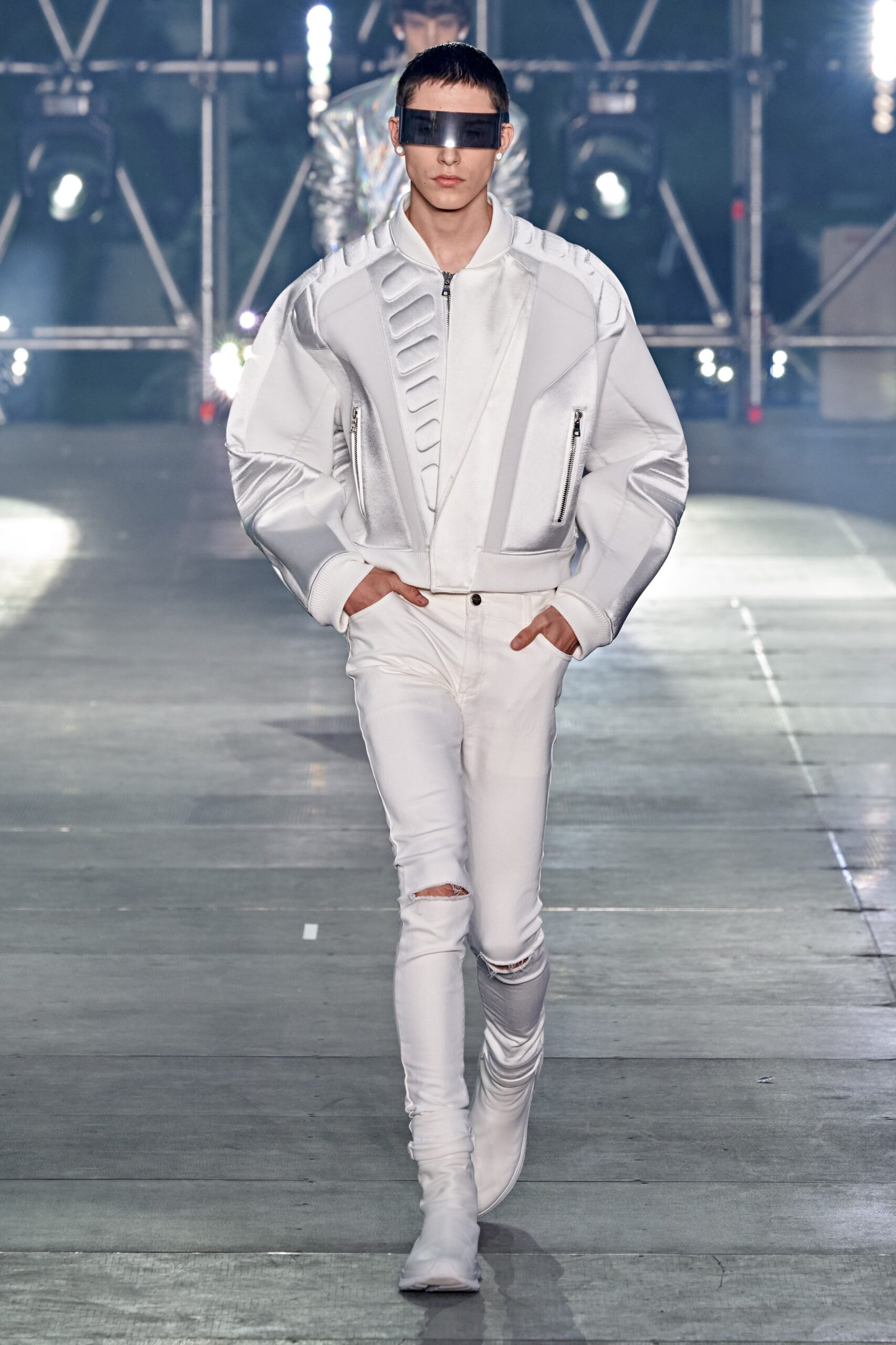 white leather jacket with distressed pants