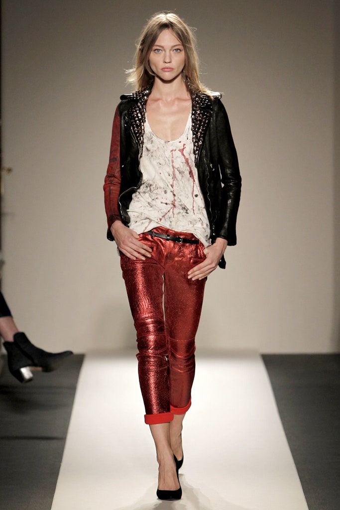 black leather jacket with red pants