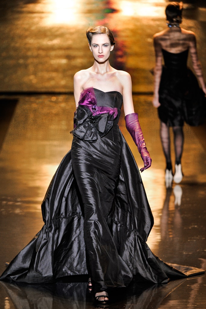 black silk strapless gown with purple gloves