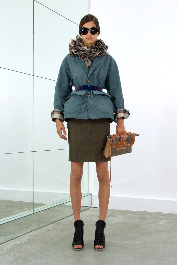 blue relaxed jacket with green pencil skirt