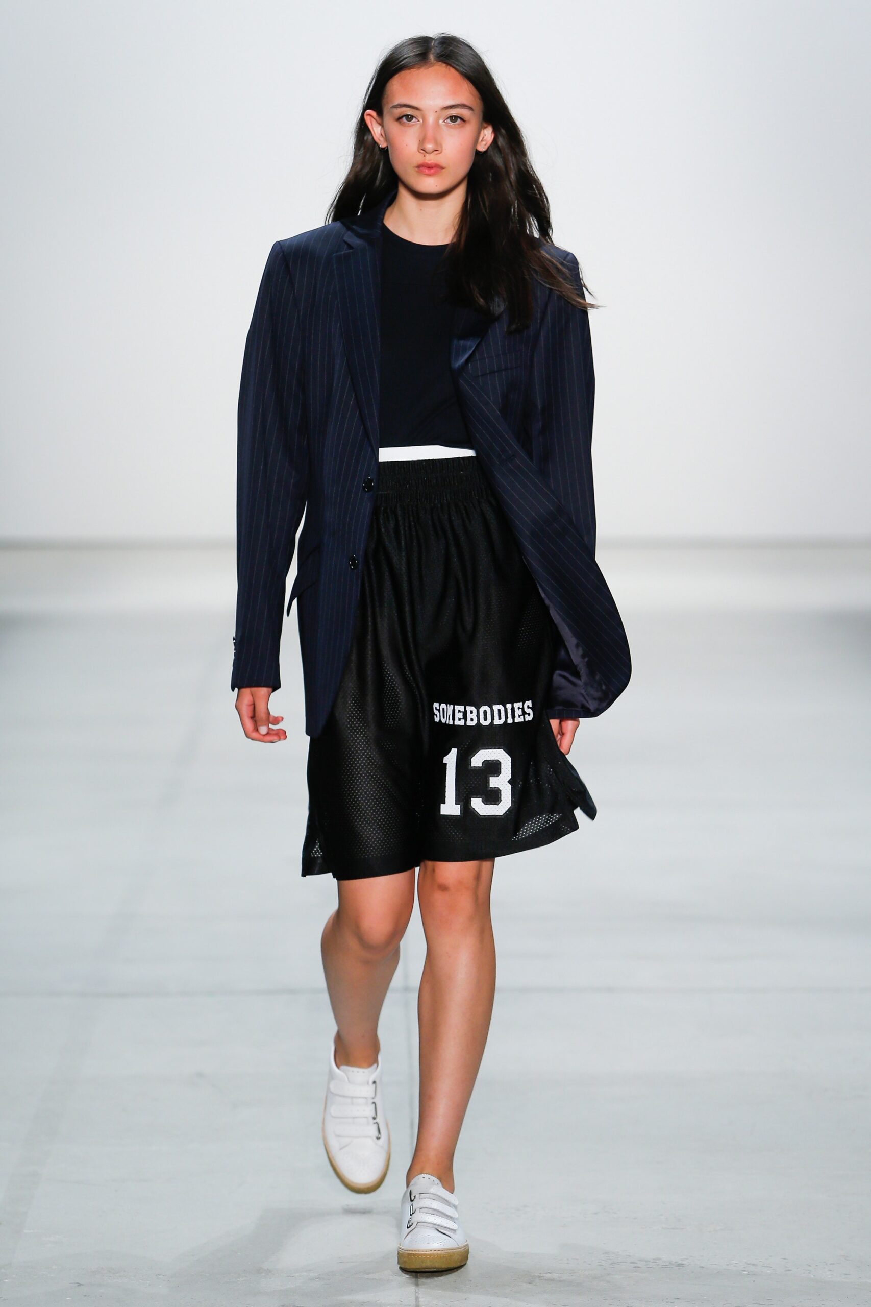 blue striped blazer with black shorts