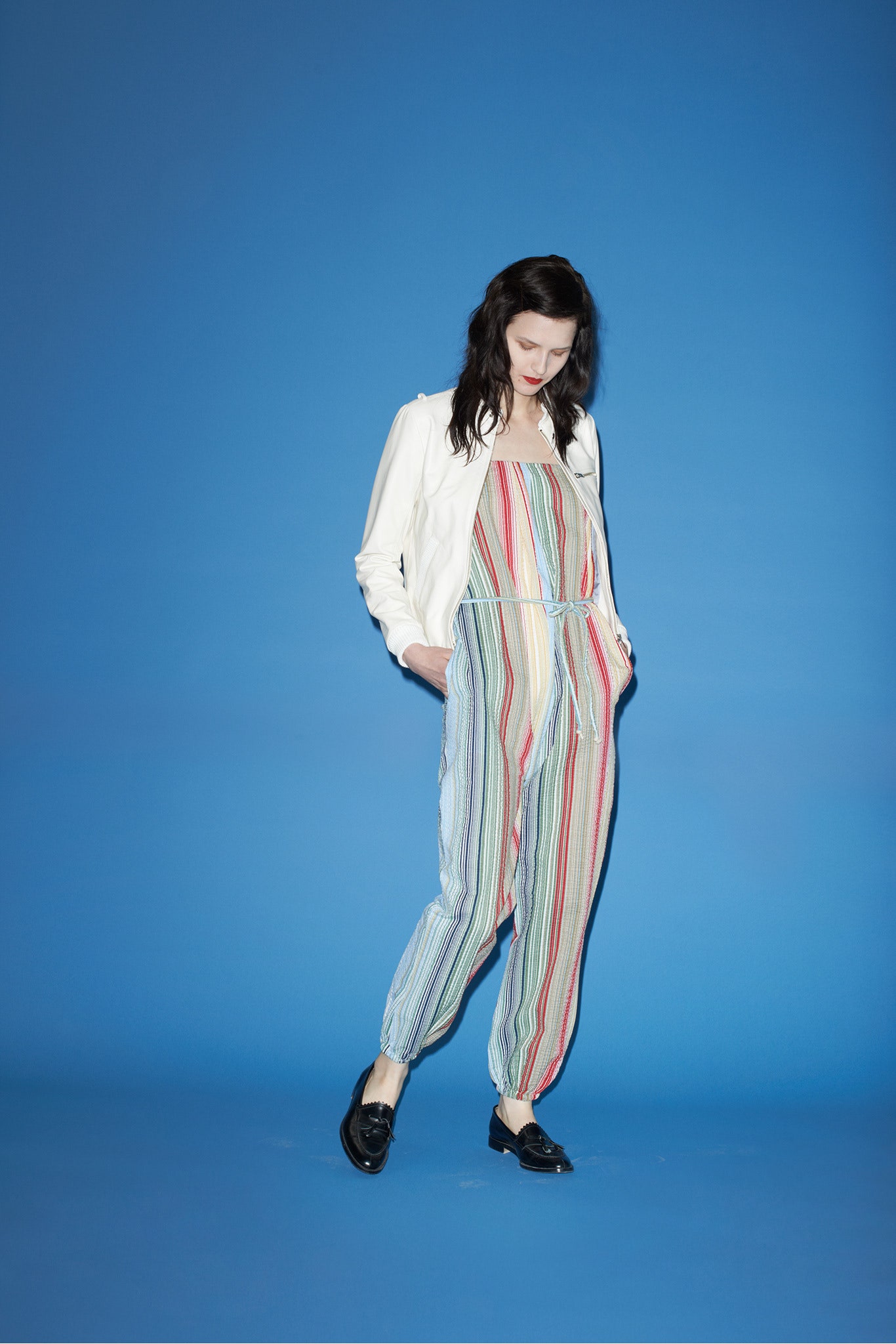 striped jumpsuit with leather jacket