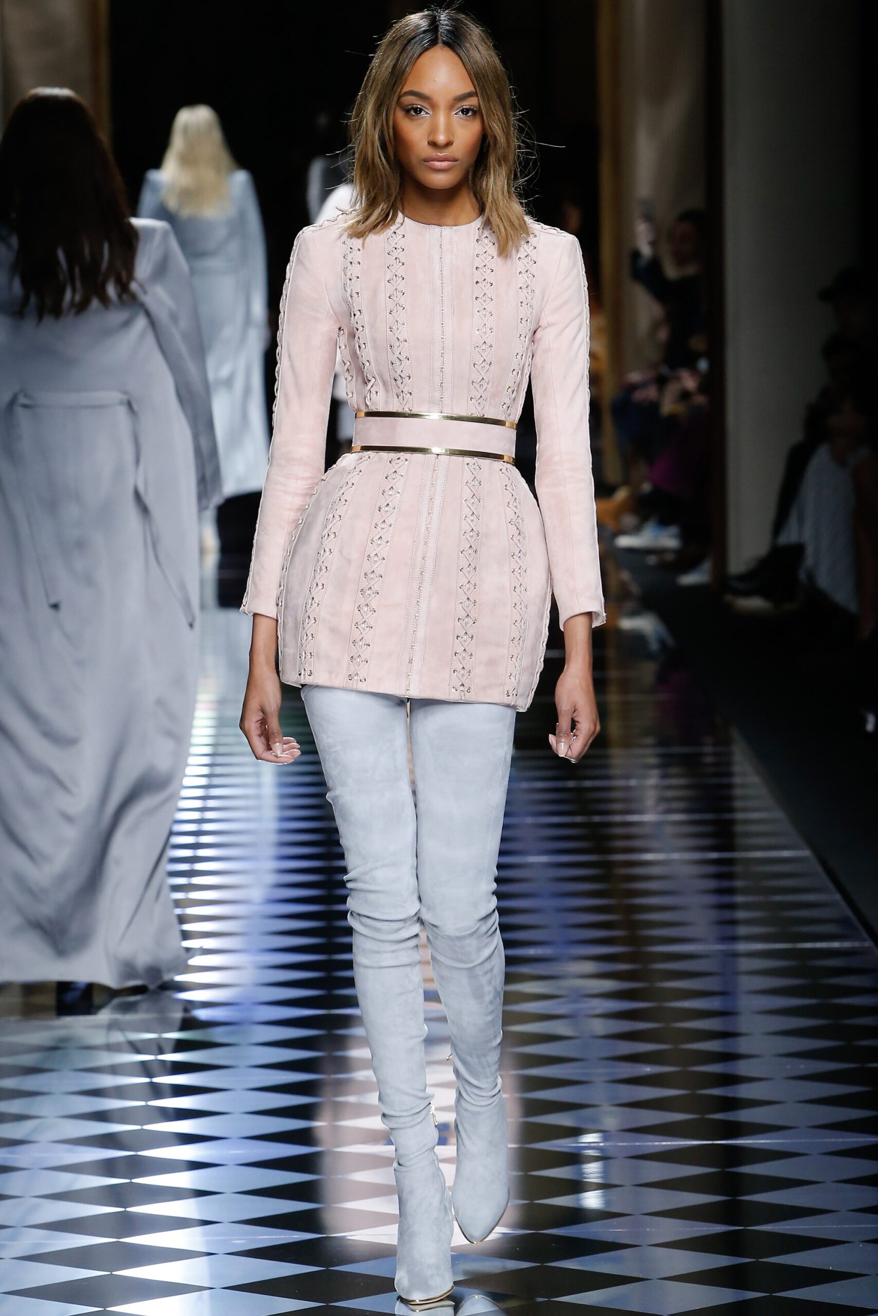 fitted pink suede mini dress with thigh-high gray boots