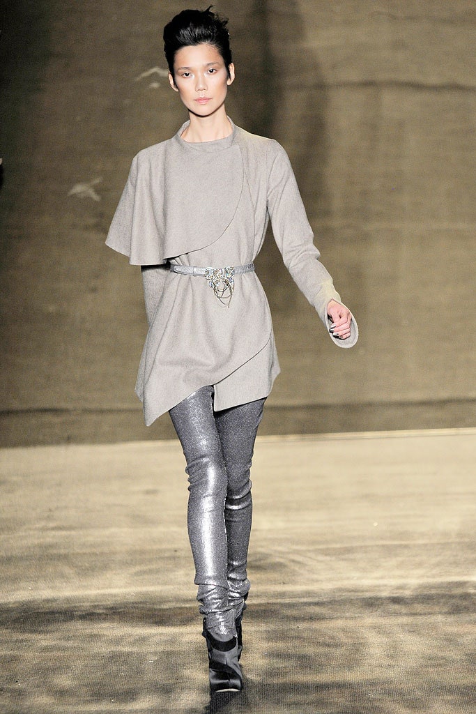 gray draped top with metallic pants