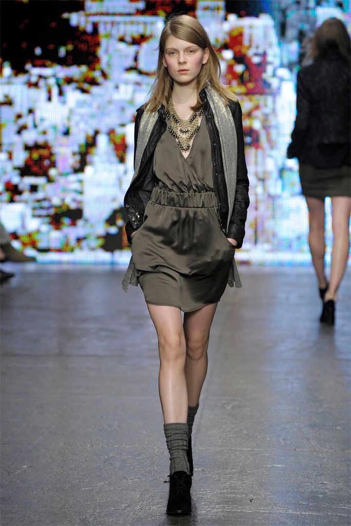 green silk mini dress with black leather jacket