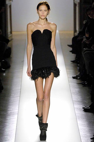 black strapless mini dress with fringes
