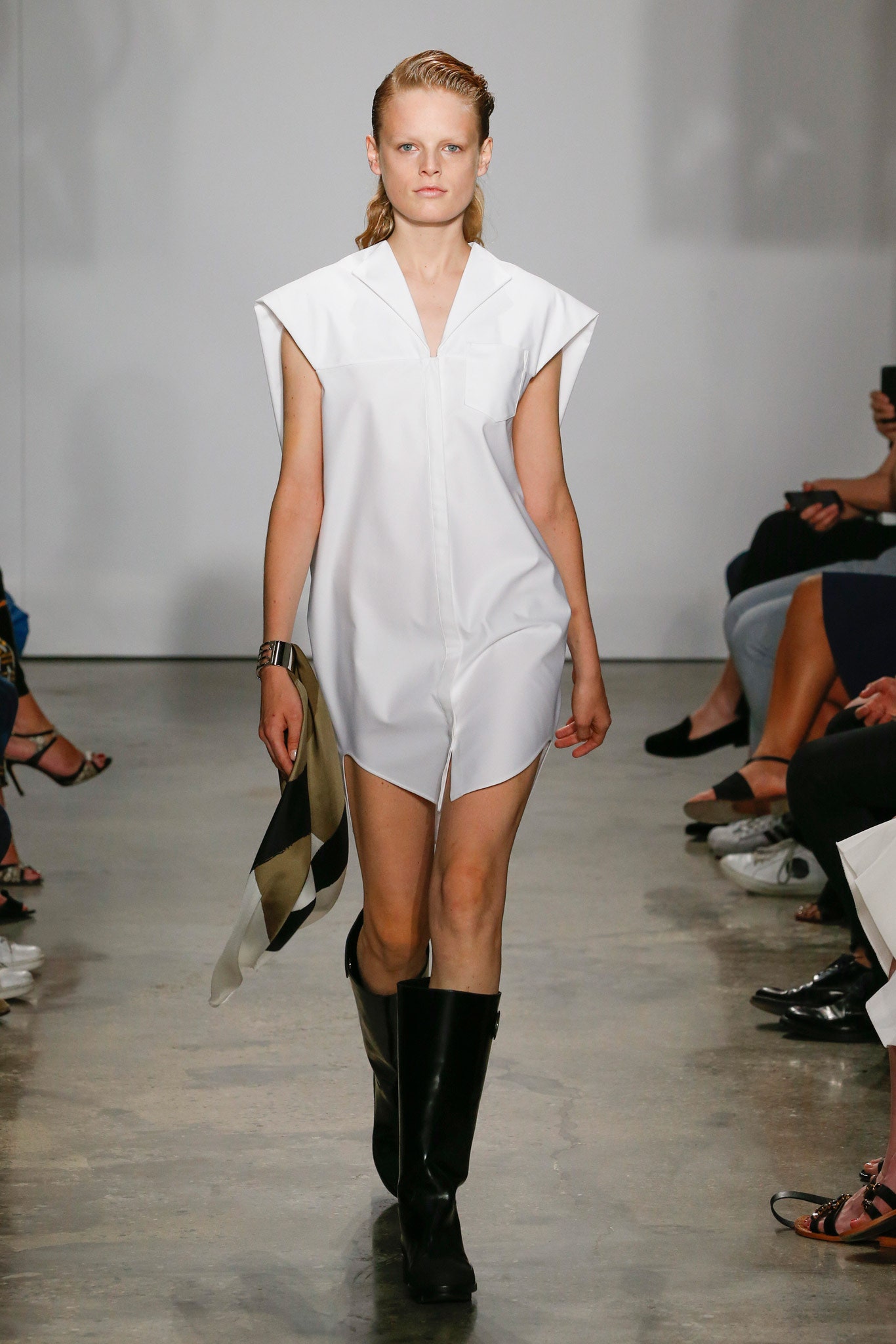 white shirt-dress with black boots