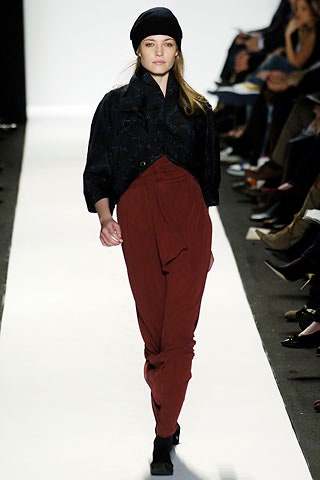 black silk blouse with red pants