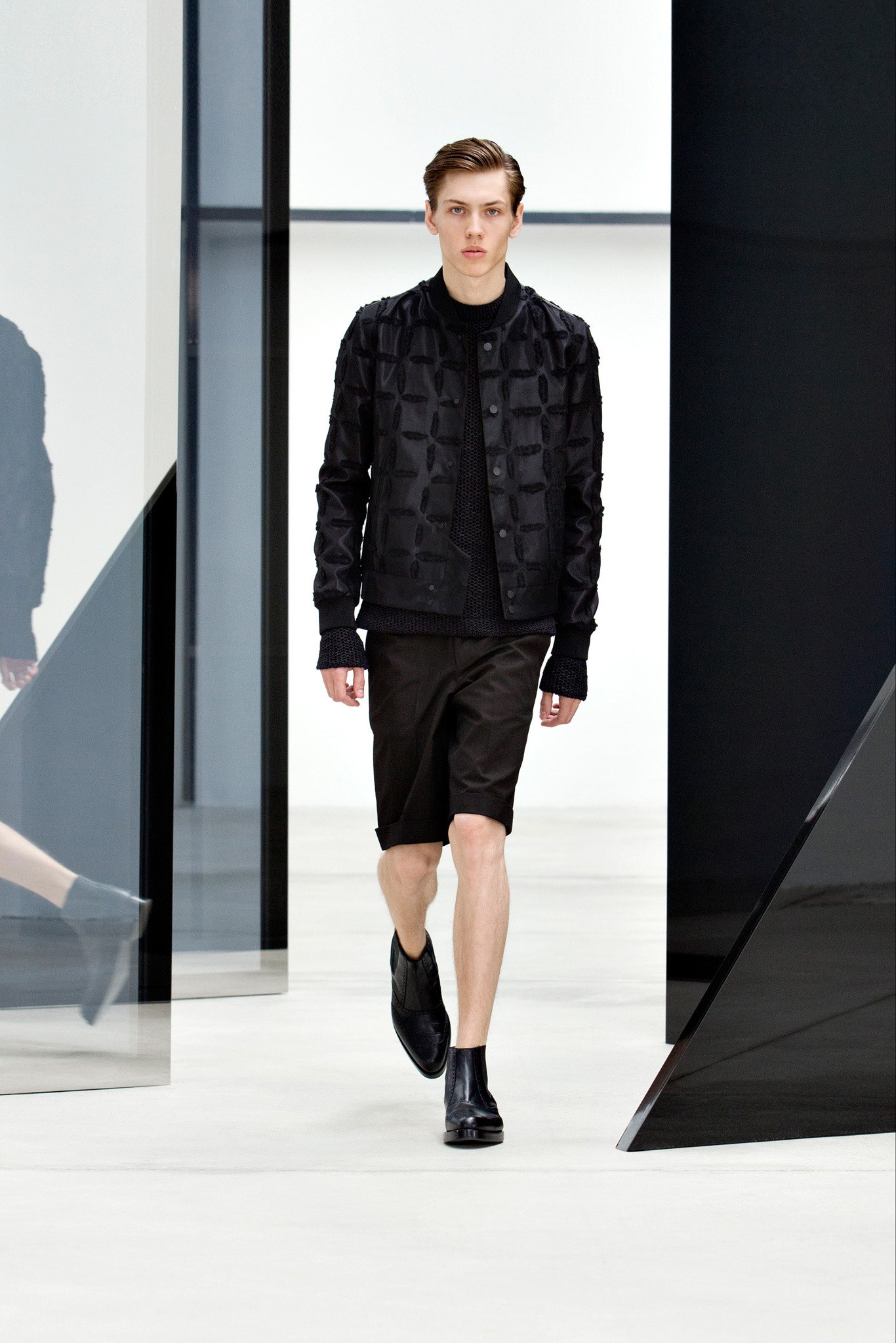 black fitted jacket and shorts