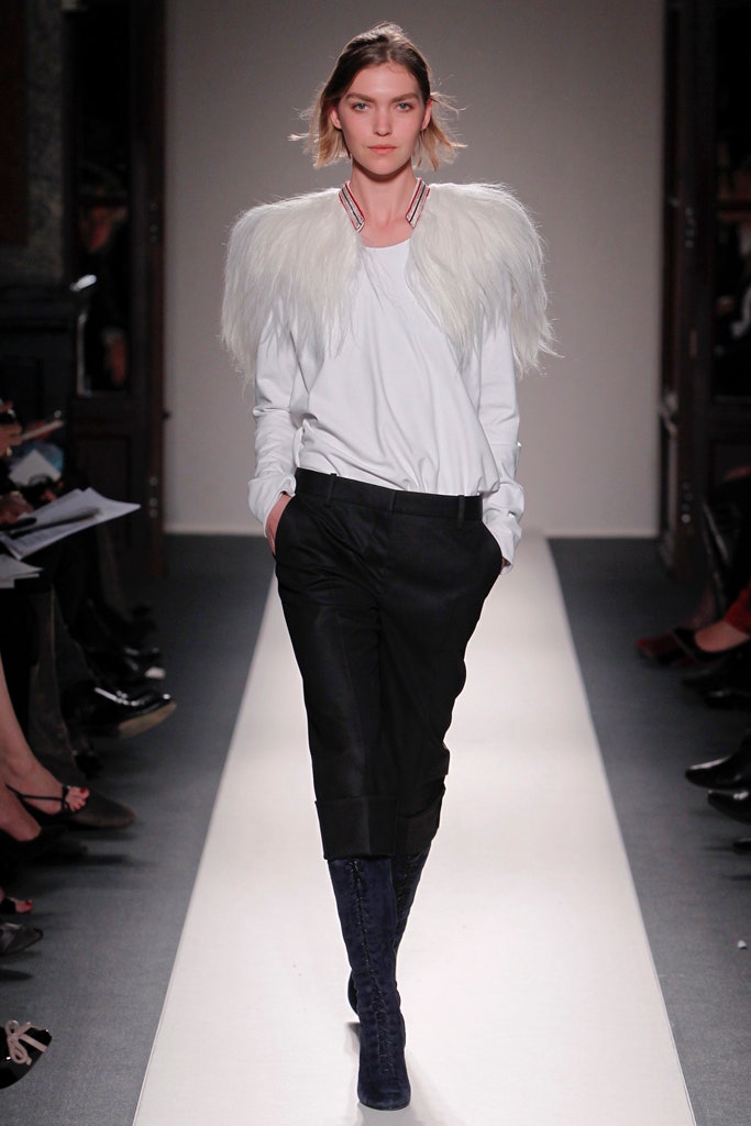 white relaxed top with black tailored pants