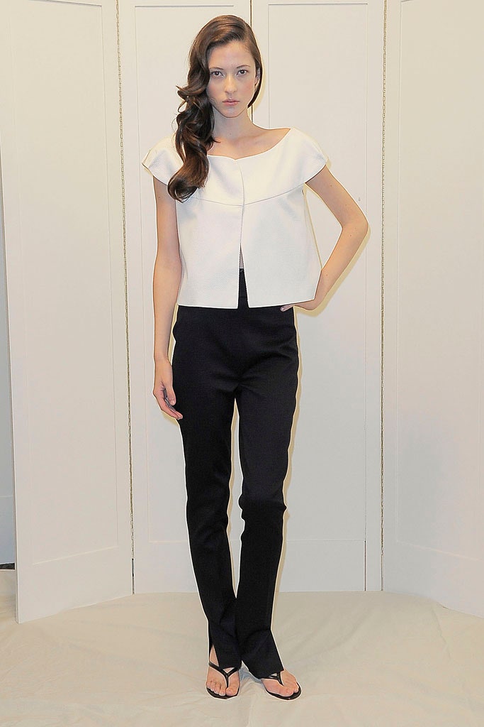 white fitted top and black tailored pants