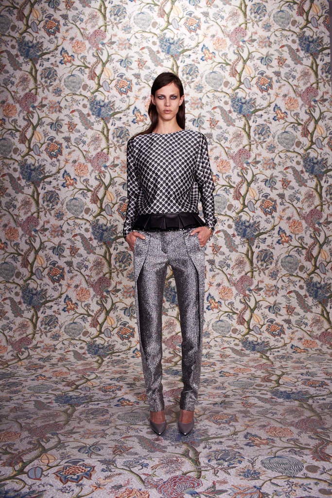 black and white checked top with silver pants