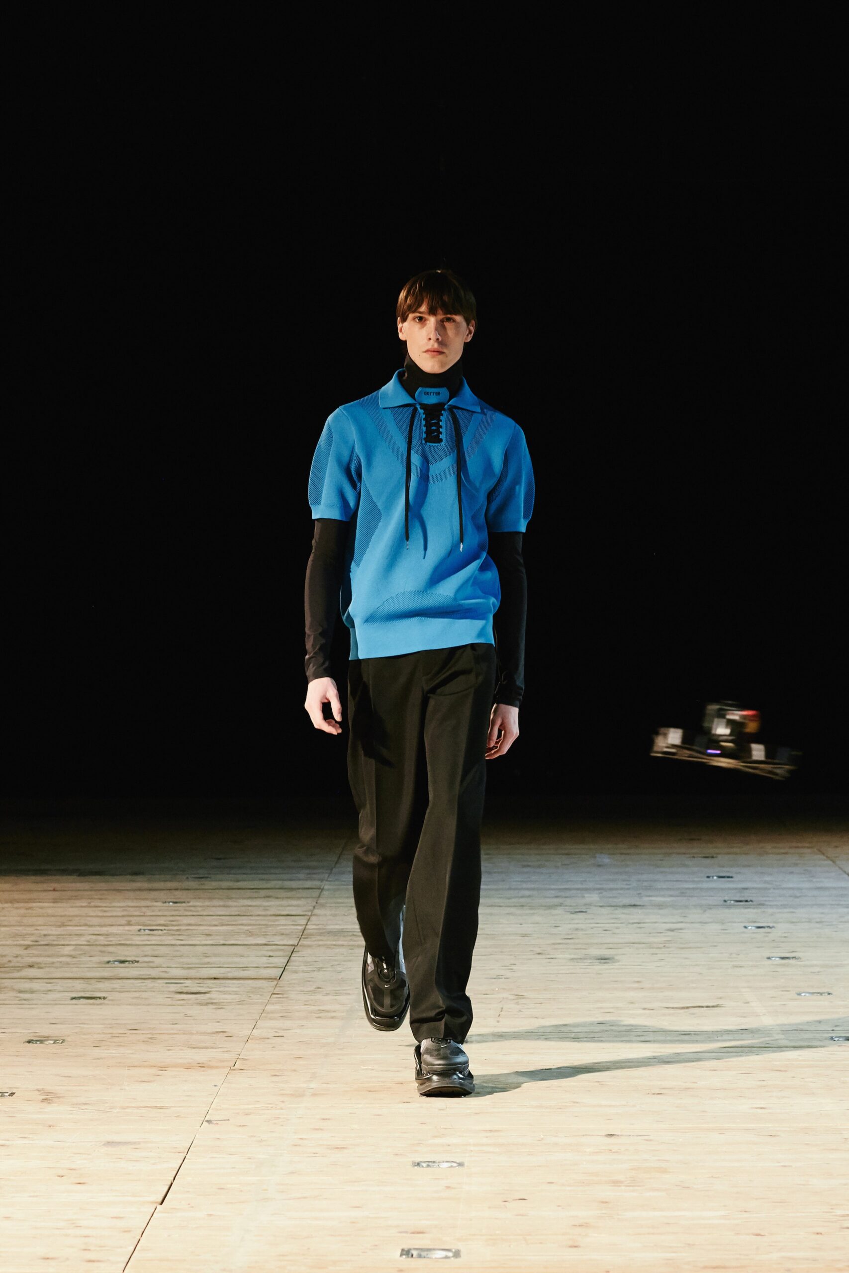 blue knit collared short-sleeve sweater