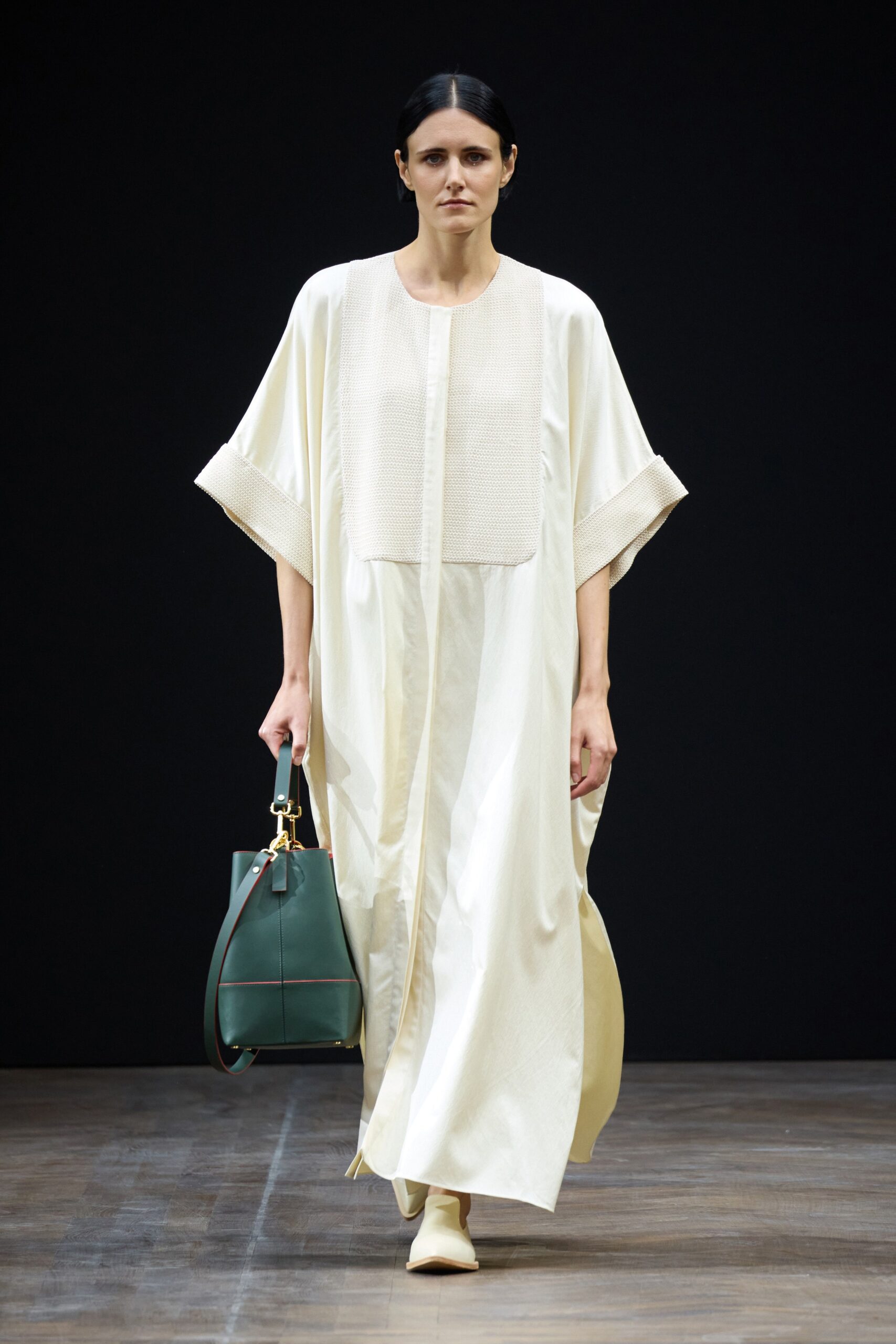 ivory flowing panelled maxi gown