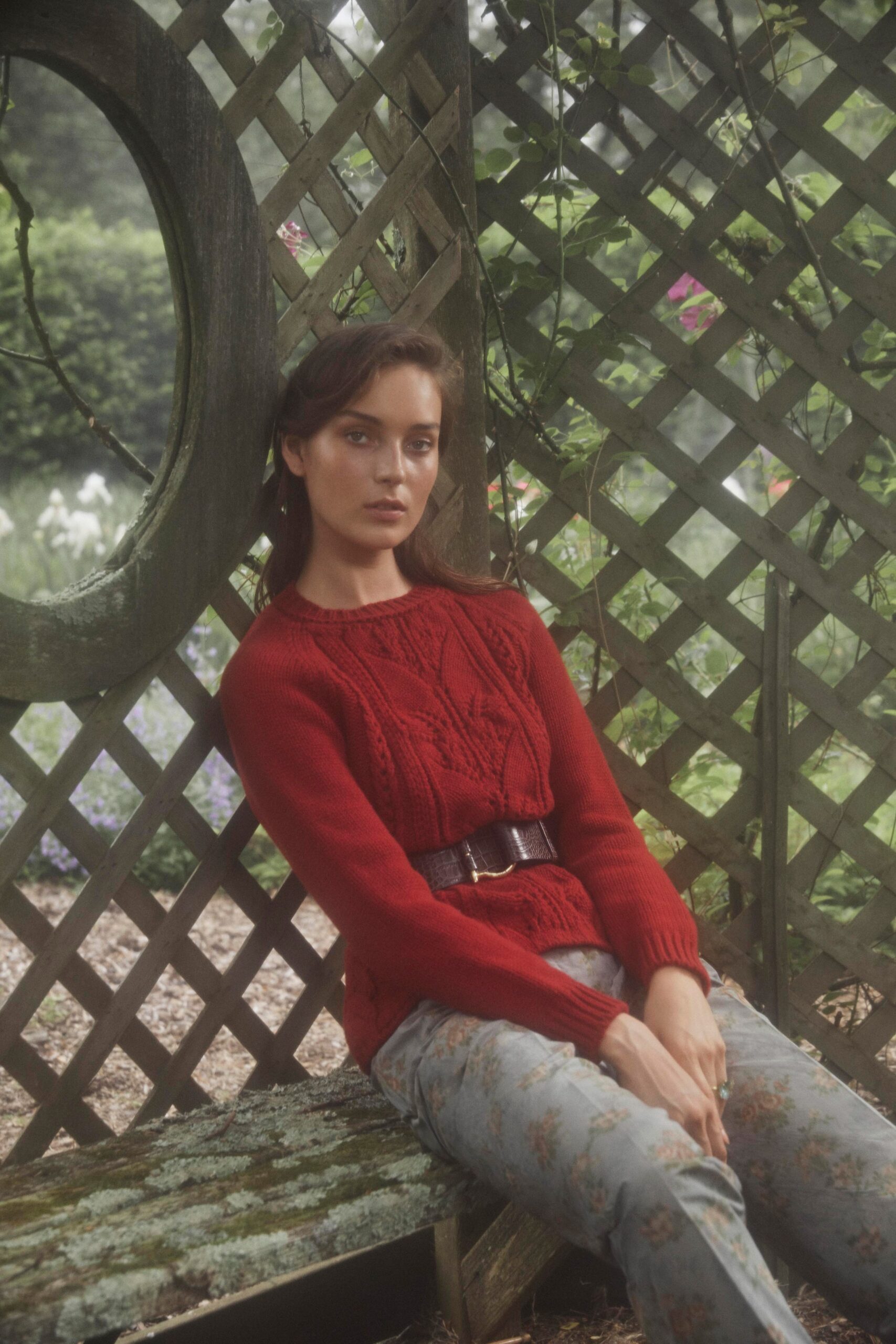 red cable-knit belted sweater