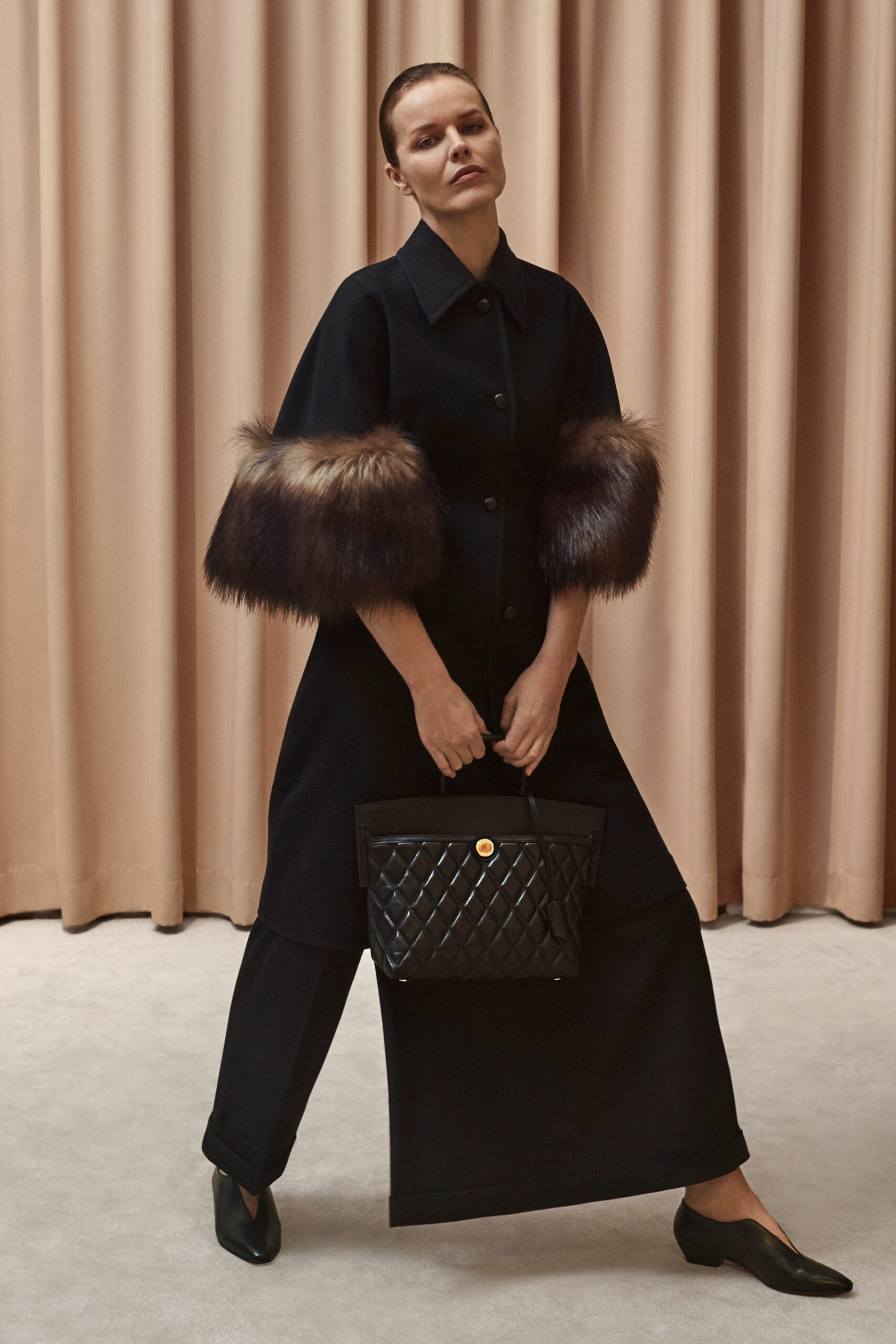 black leather quilted bag