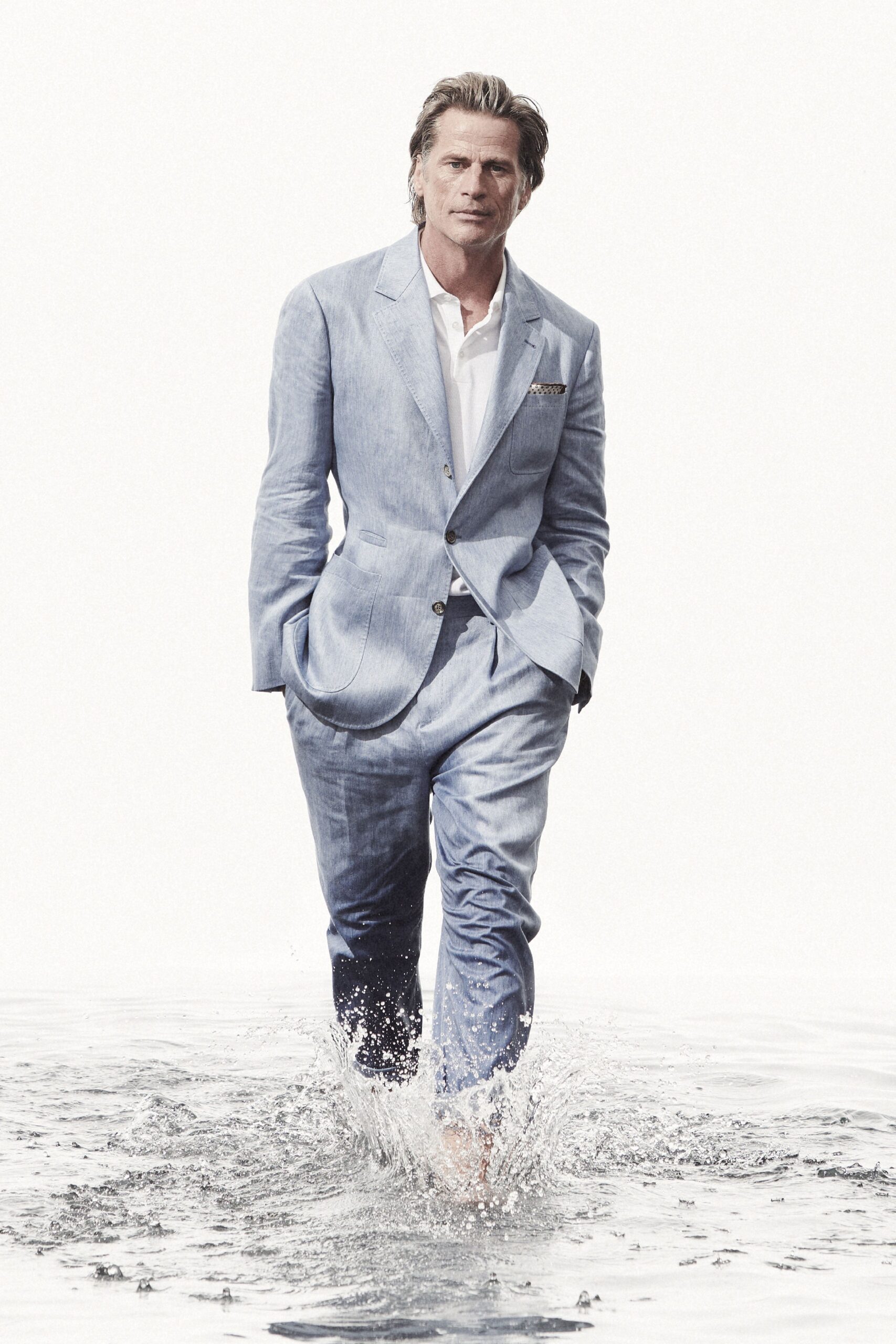 blue linen long-sleeve collared tailored buttoned pockets blazer