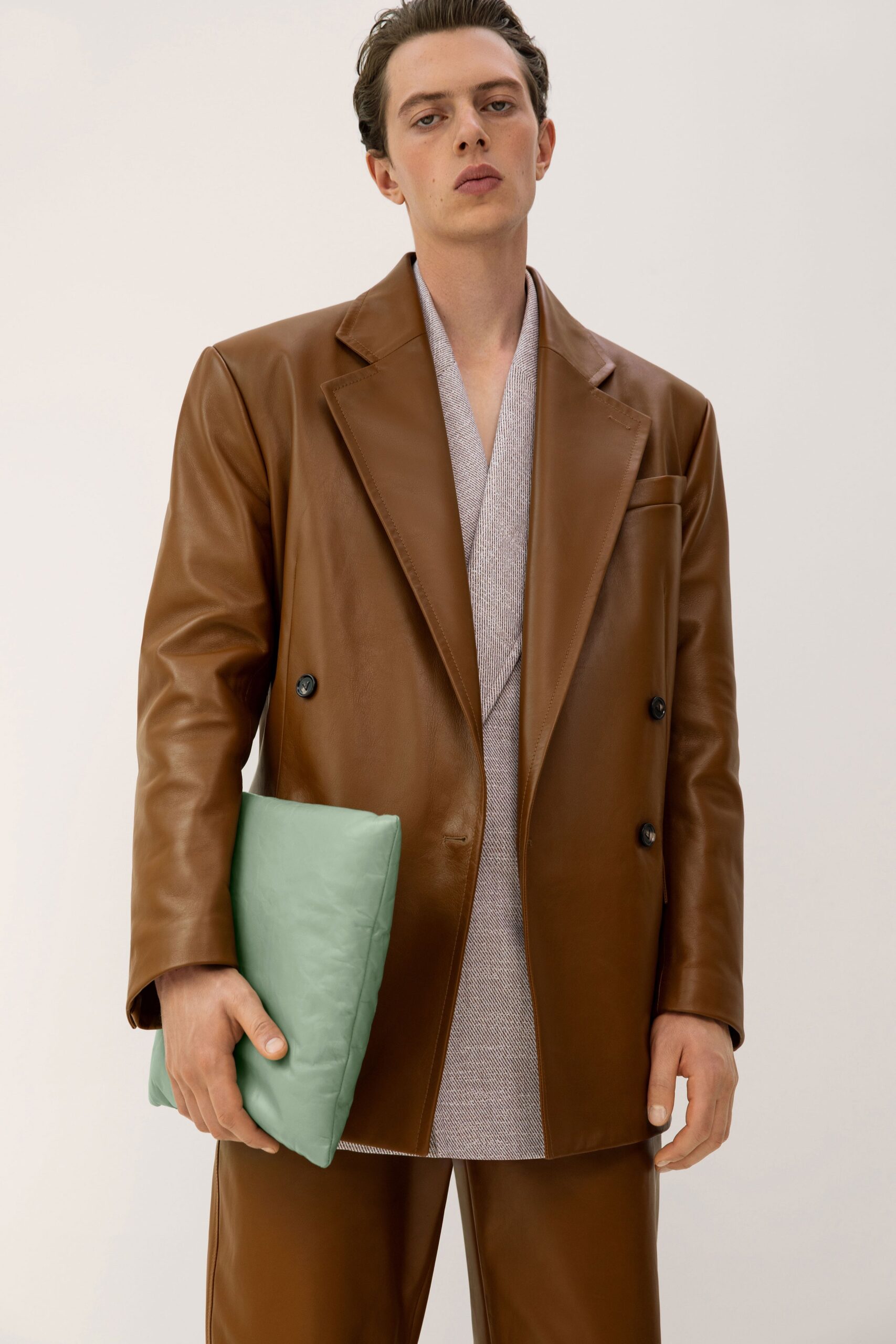 green leather clutch