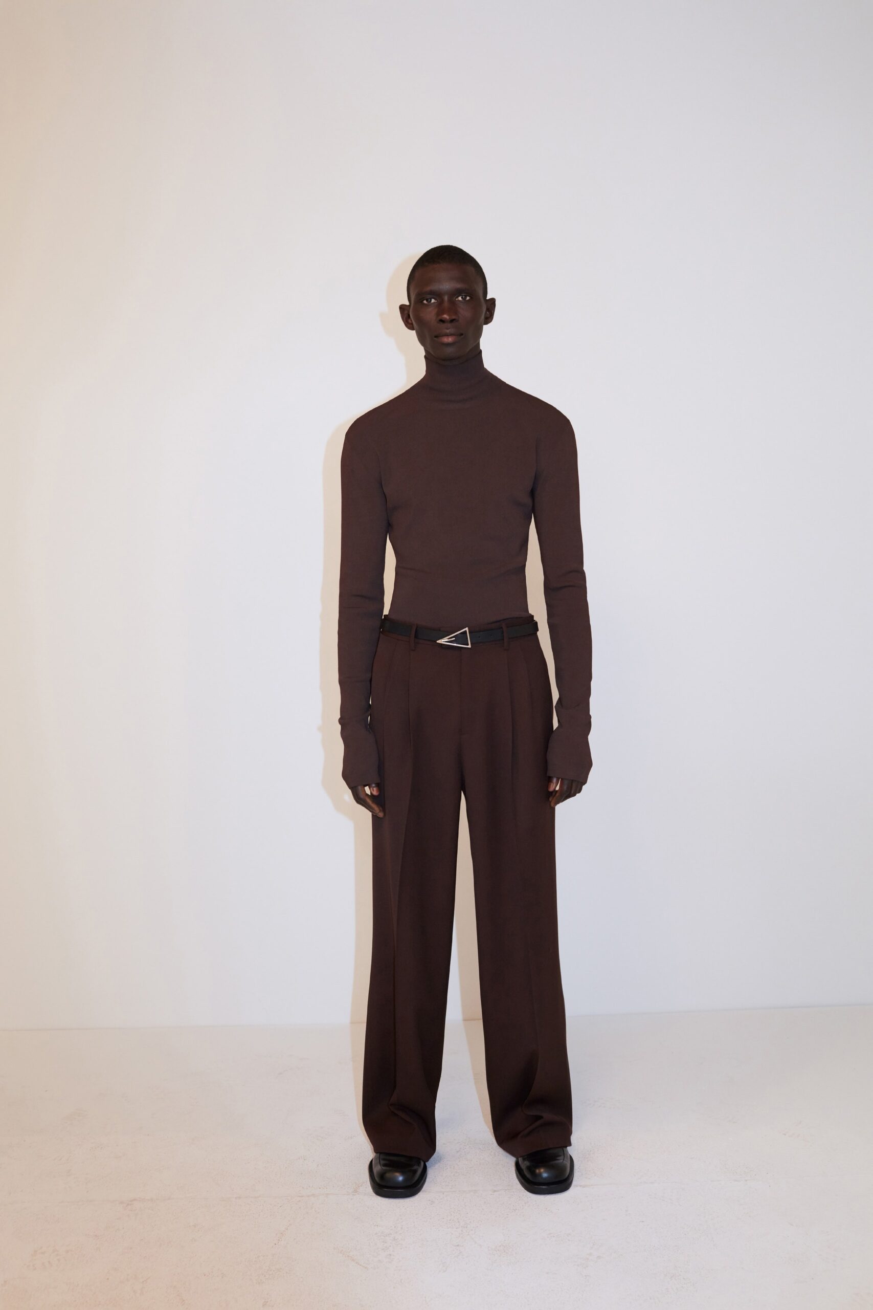 brown fitted turtleneck sweater