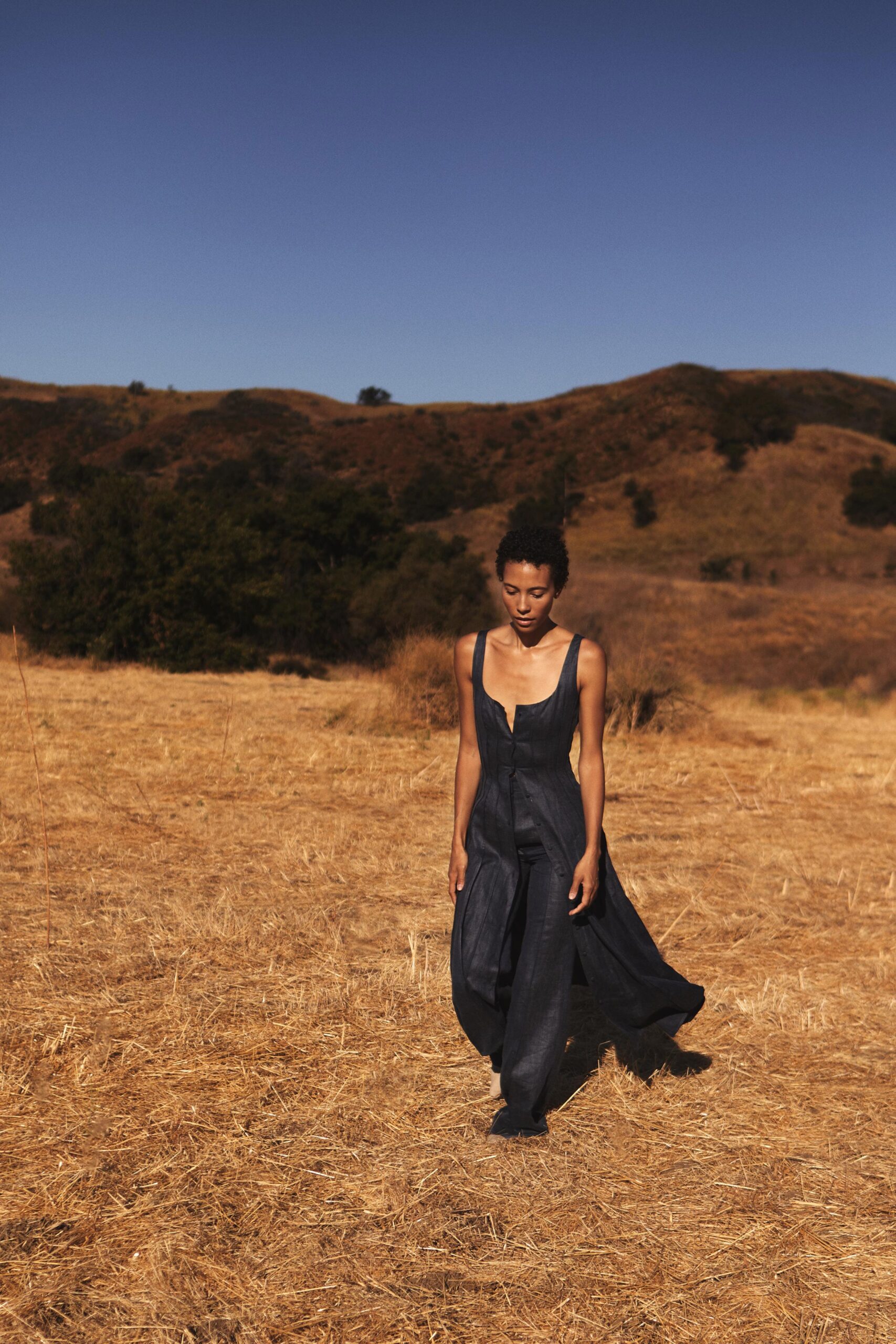 blue sleeveless flowing jumpsuit