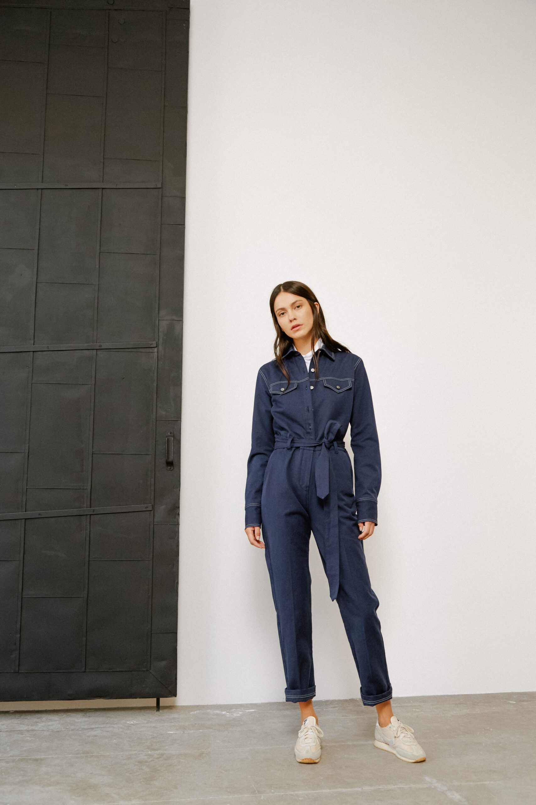 blue belted long-sleeve jumpsuit
