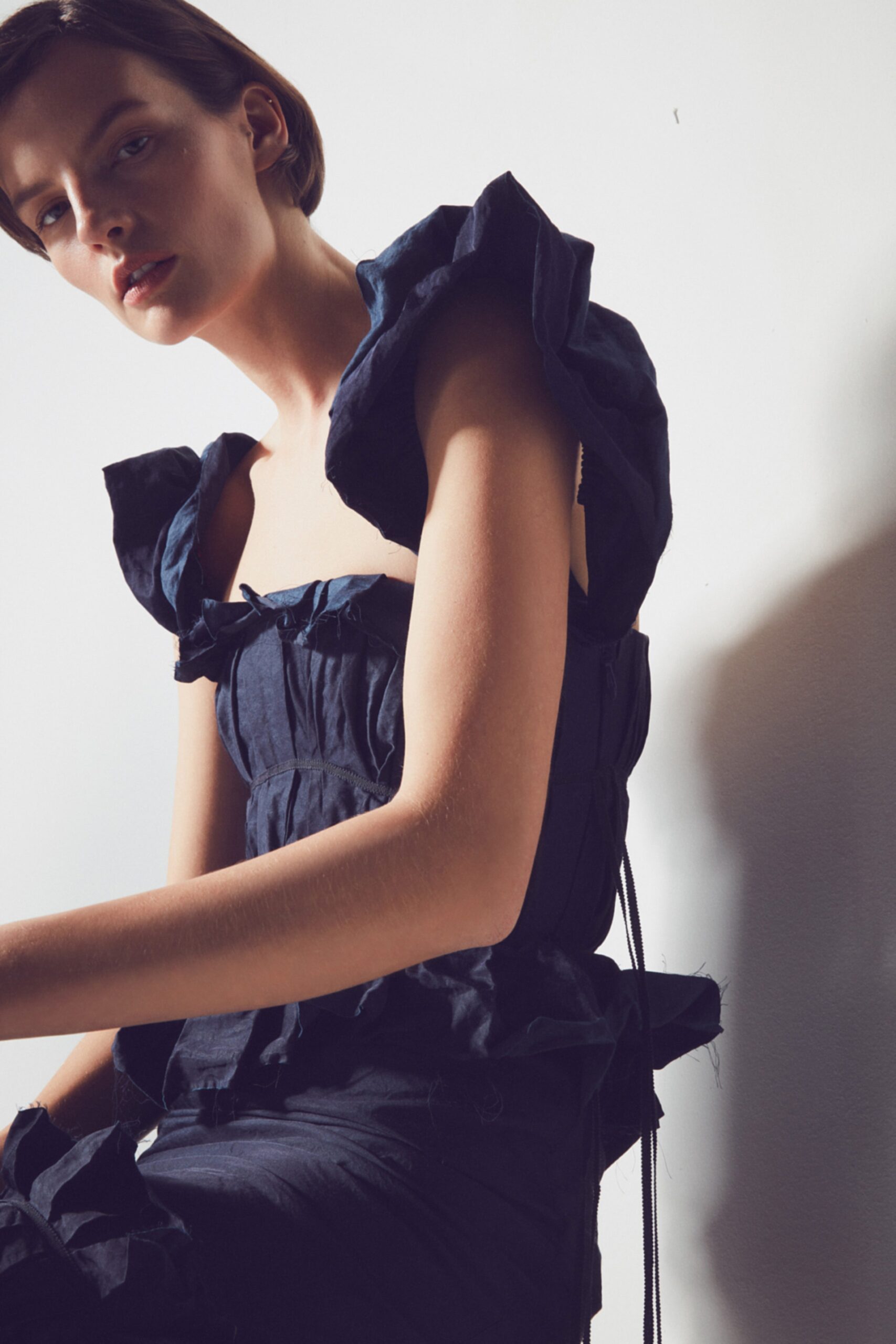 black ruffled square-neck dress