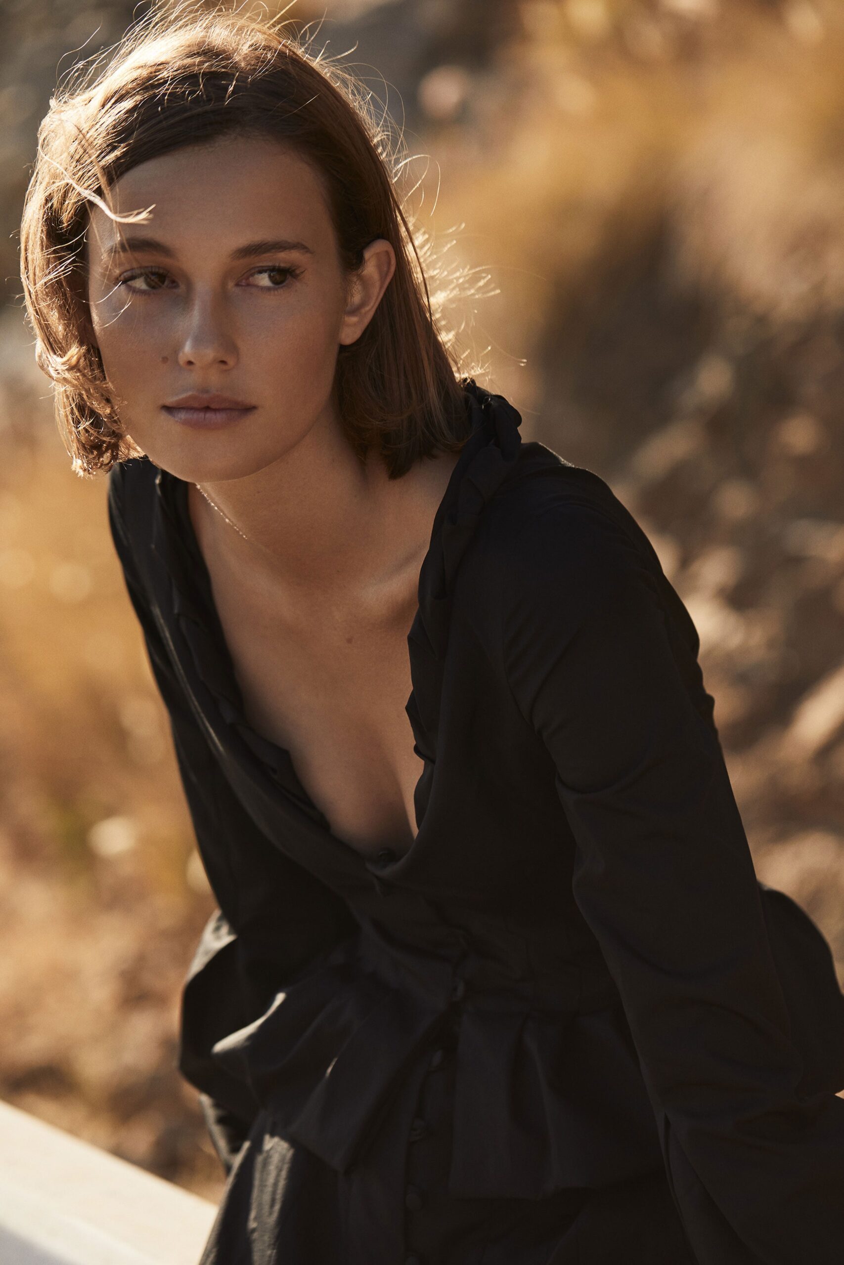 black ruffled long-sleeve dress