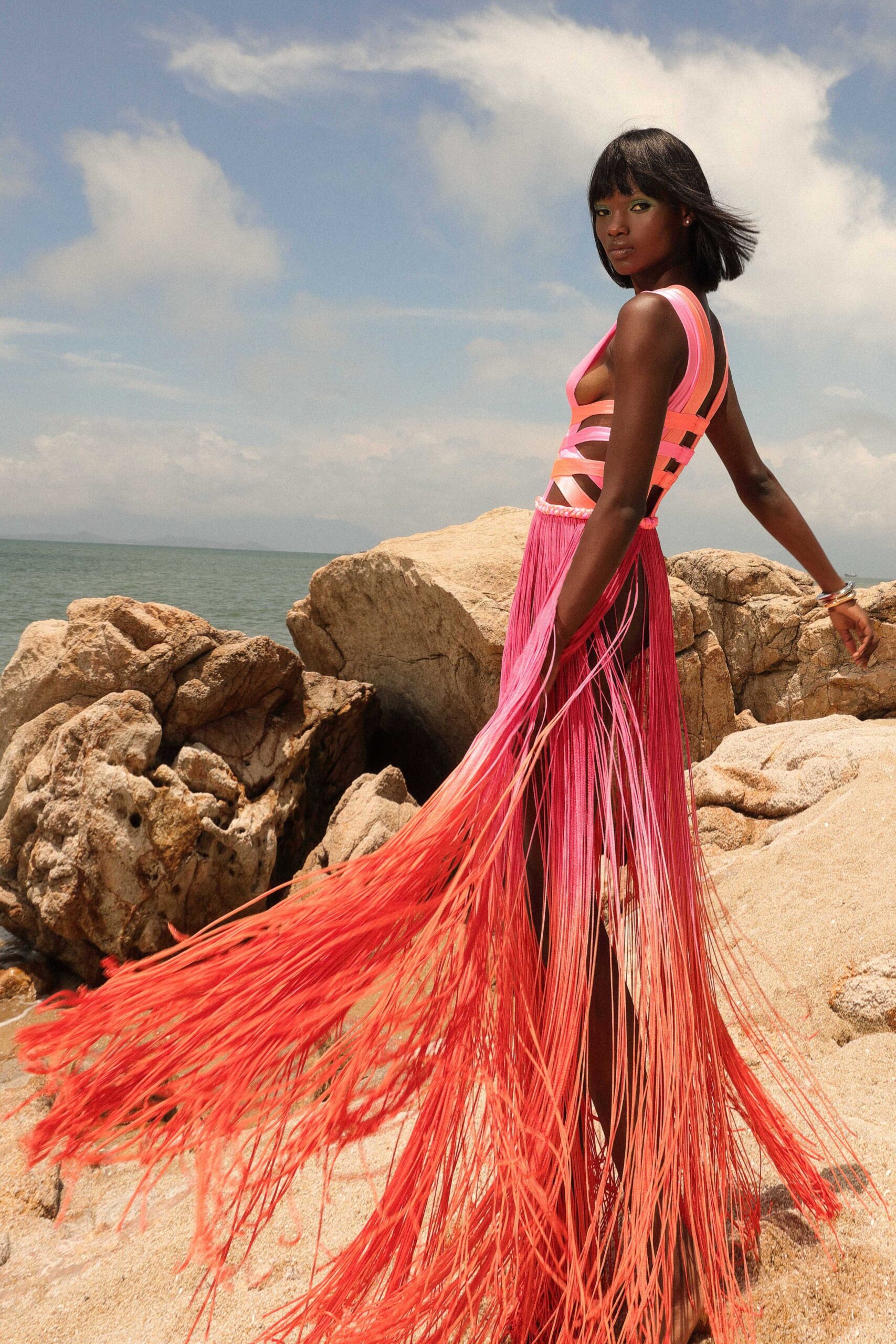 pink unknown sleeveless v-neck fitted fringed flowing gown