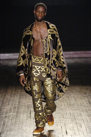 black and gold printed cape