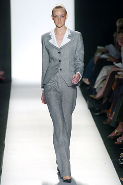 gray tailored pantsuit with white lapels