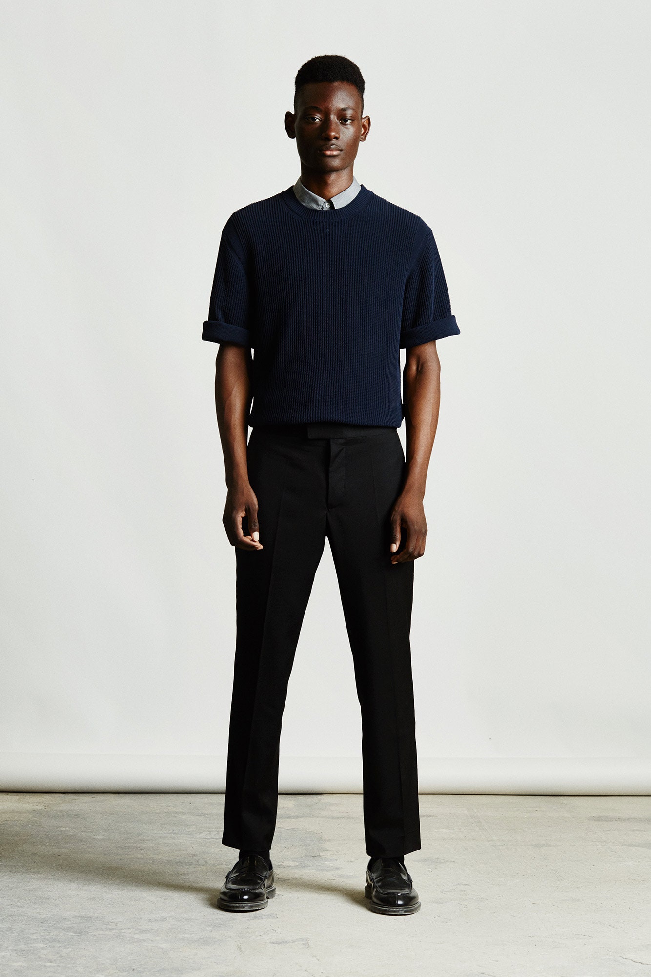 blue knit short-sleeve collared relaxed ribbed textured sweater