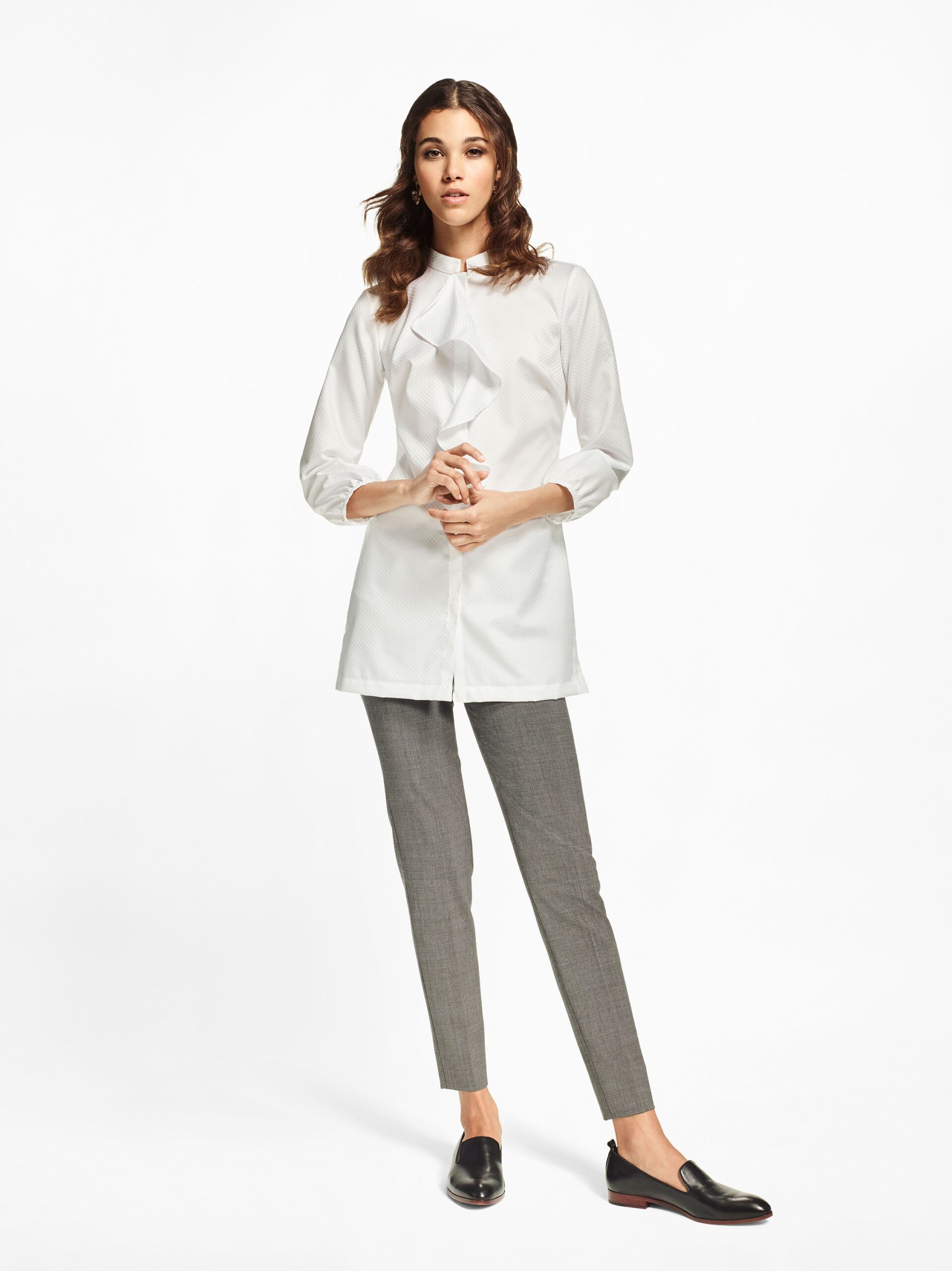 white ruffle-front high-neck blouse