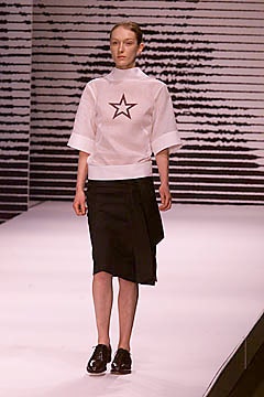 white star-print high-neck top