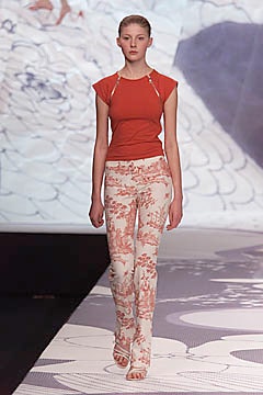 orange jersey sleeveless high-neck fitted knotted top