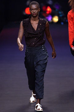 black sleeveless buttoned top