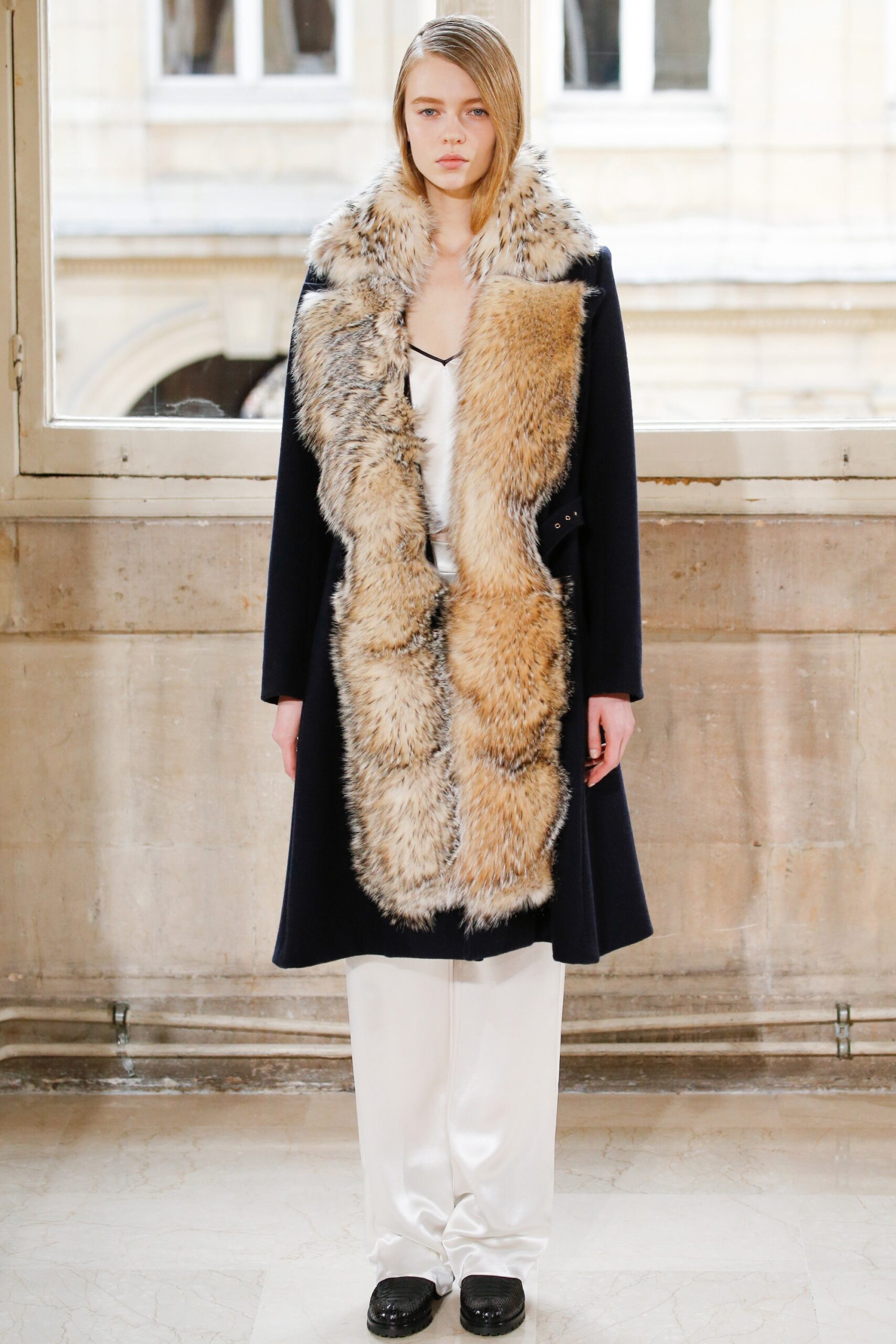fur-trimmed black maxi coat