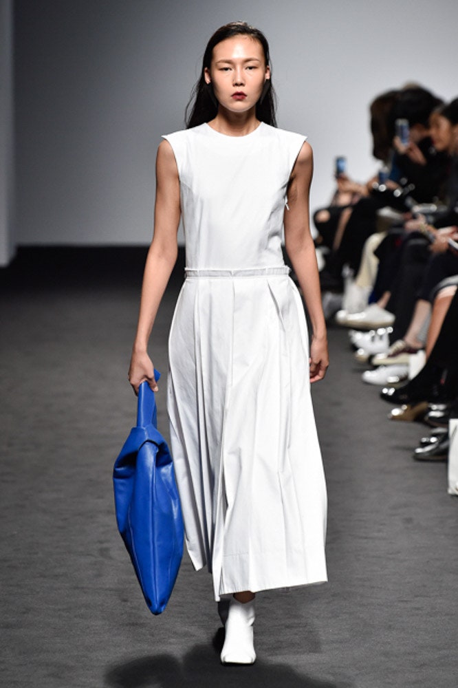 white unknown sleeveless high-neck pleated belted flowing maxi-dress