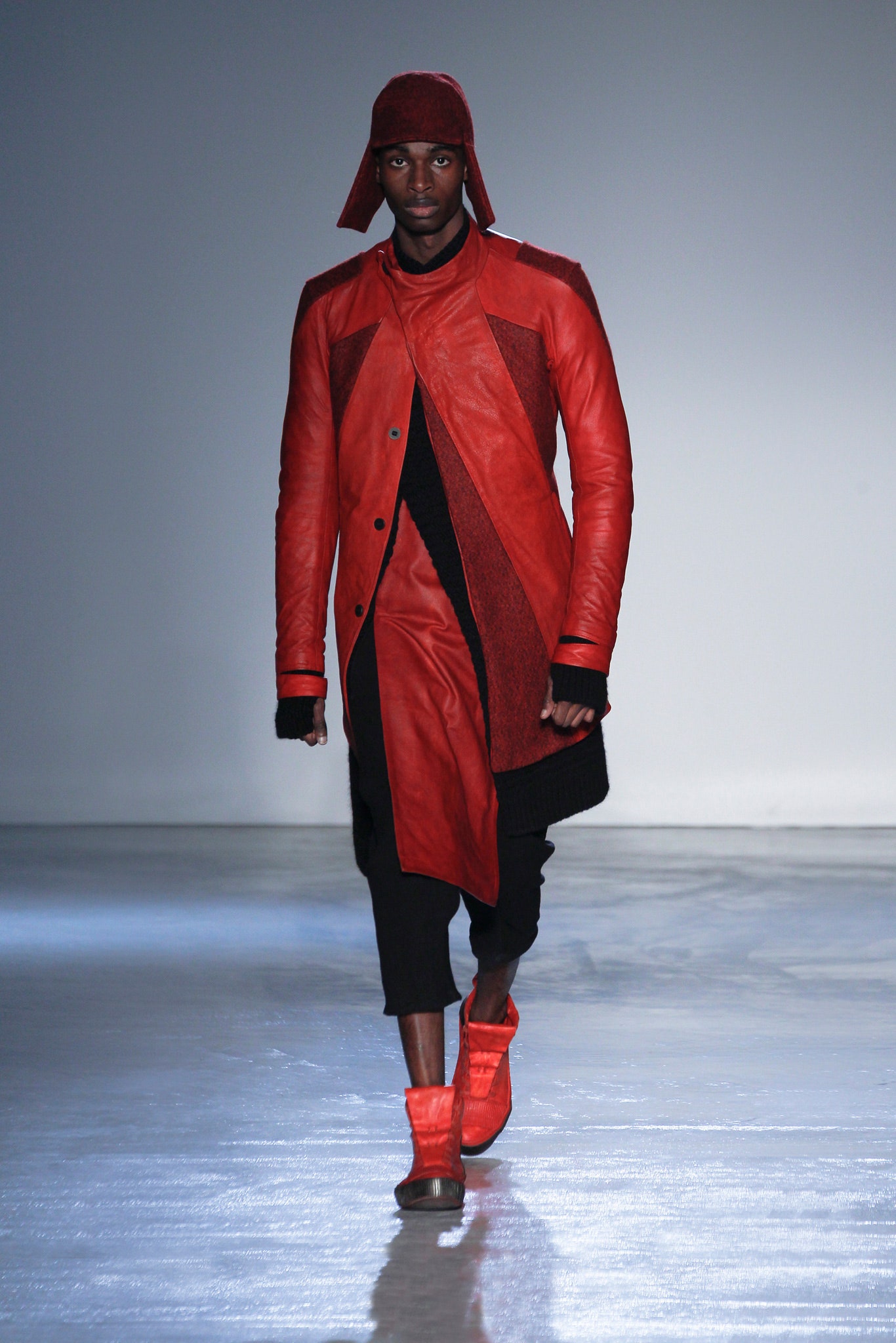 red asymmetric leather coat