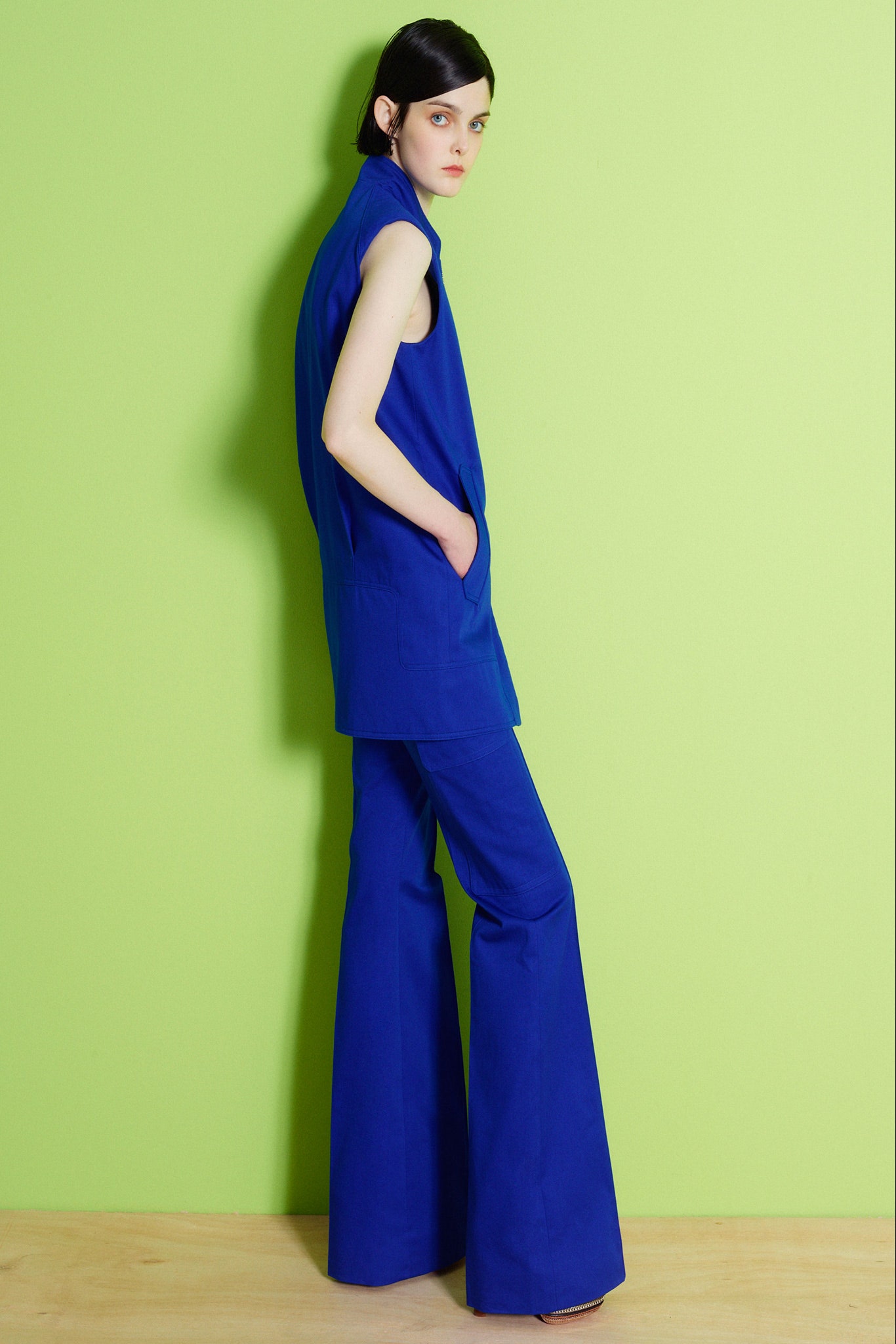 blue sleeveless longline vest