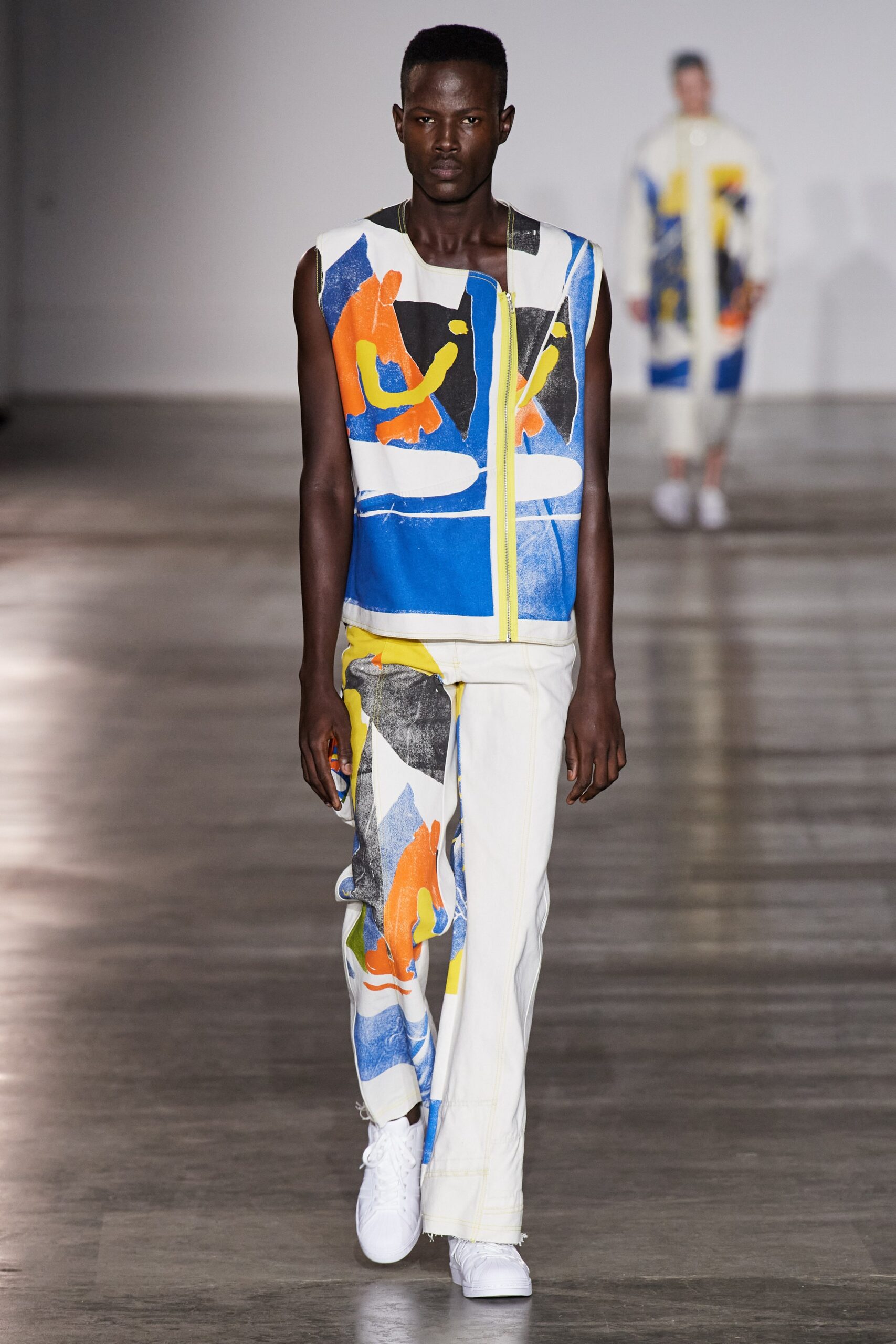 abstract printed sleeveless zip-front top