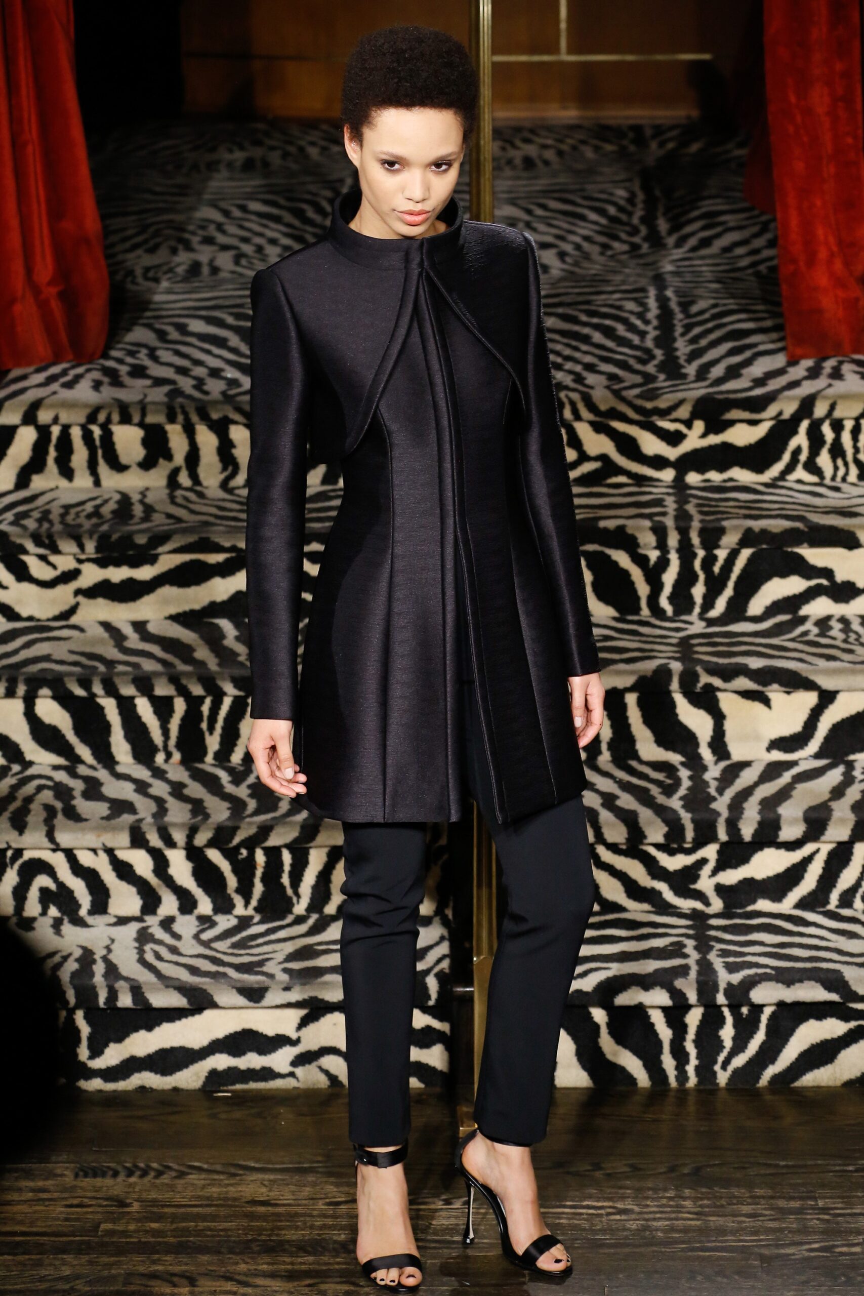 black asymmetric high-neck coat