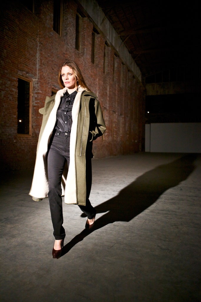 green shearling-lined long coat