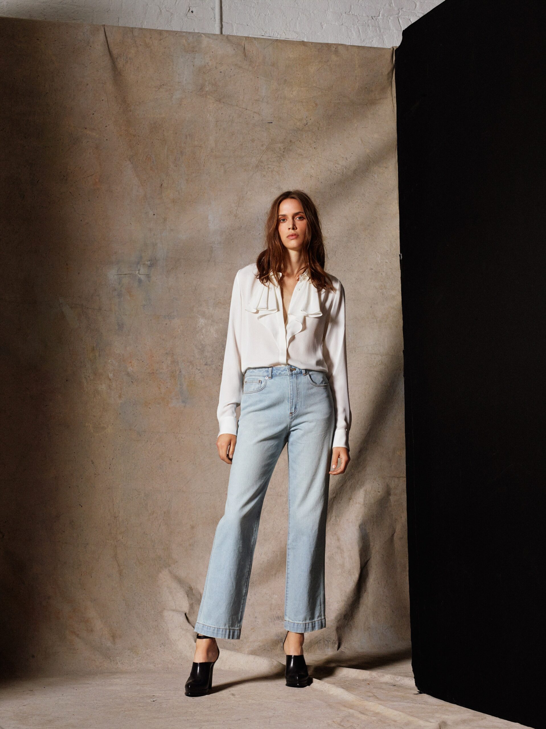 white ruffled silk blouse