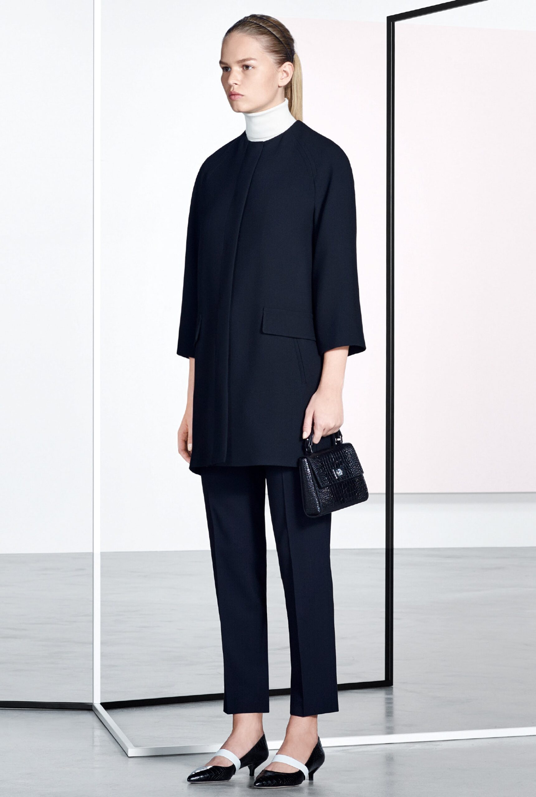 black open-front structured jacket