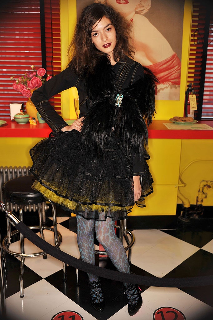 black feathered top and lace skirt