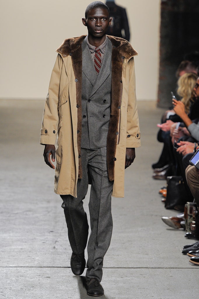 beige fur-trimmed hooded parka