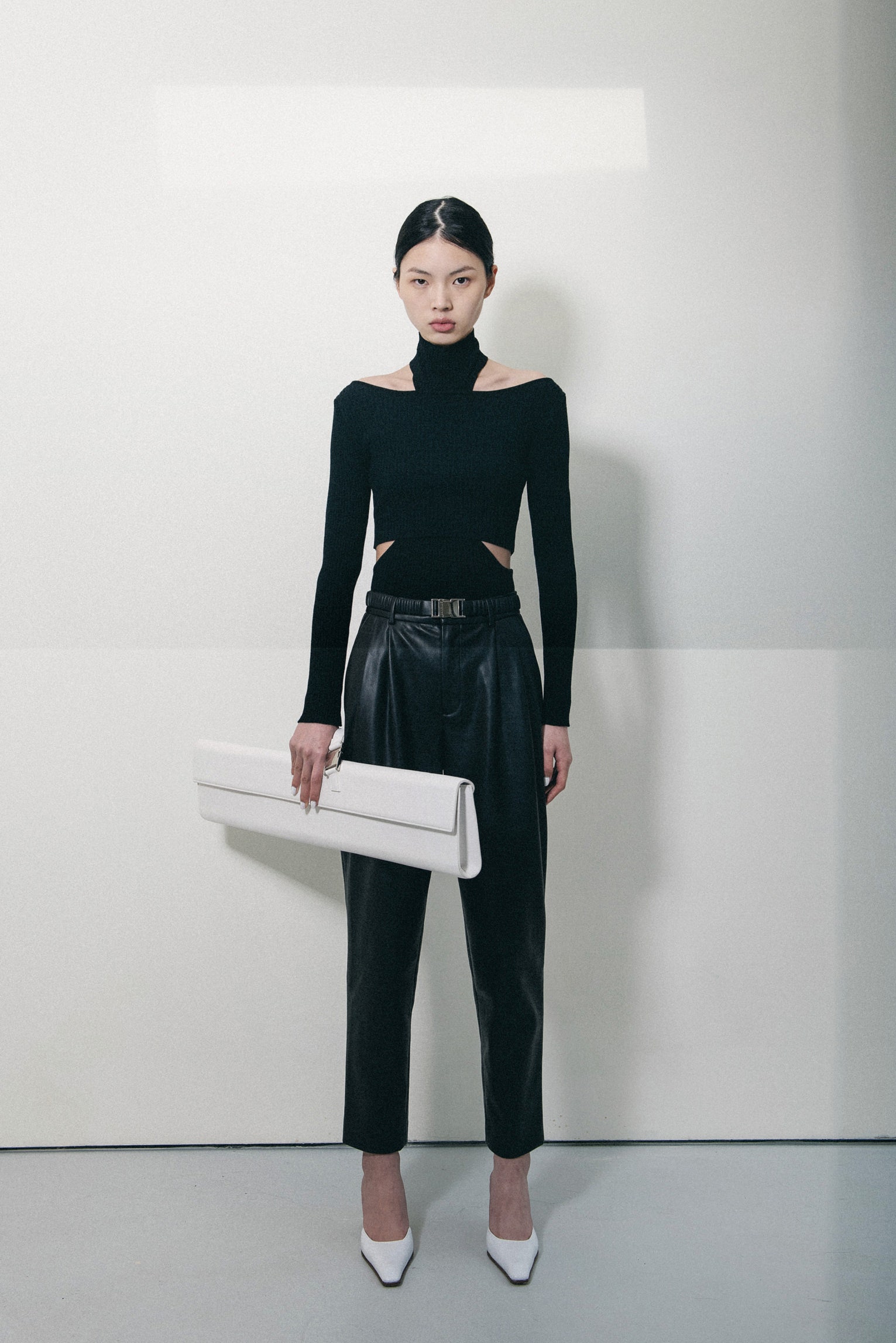 black cutout turtleneck knit top
