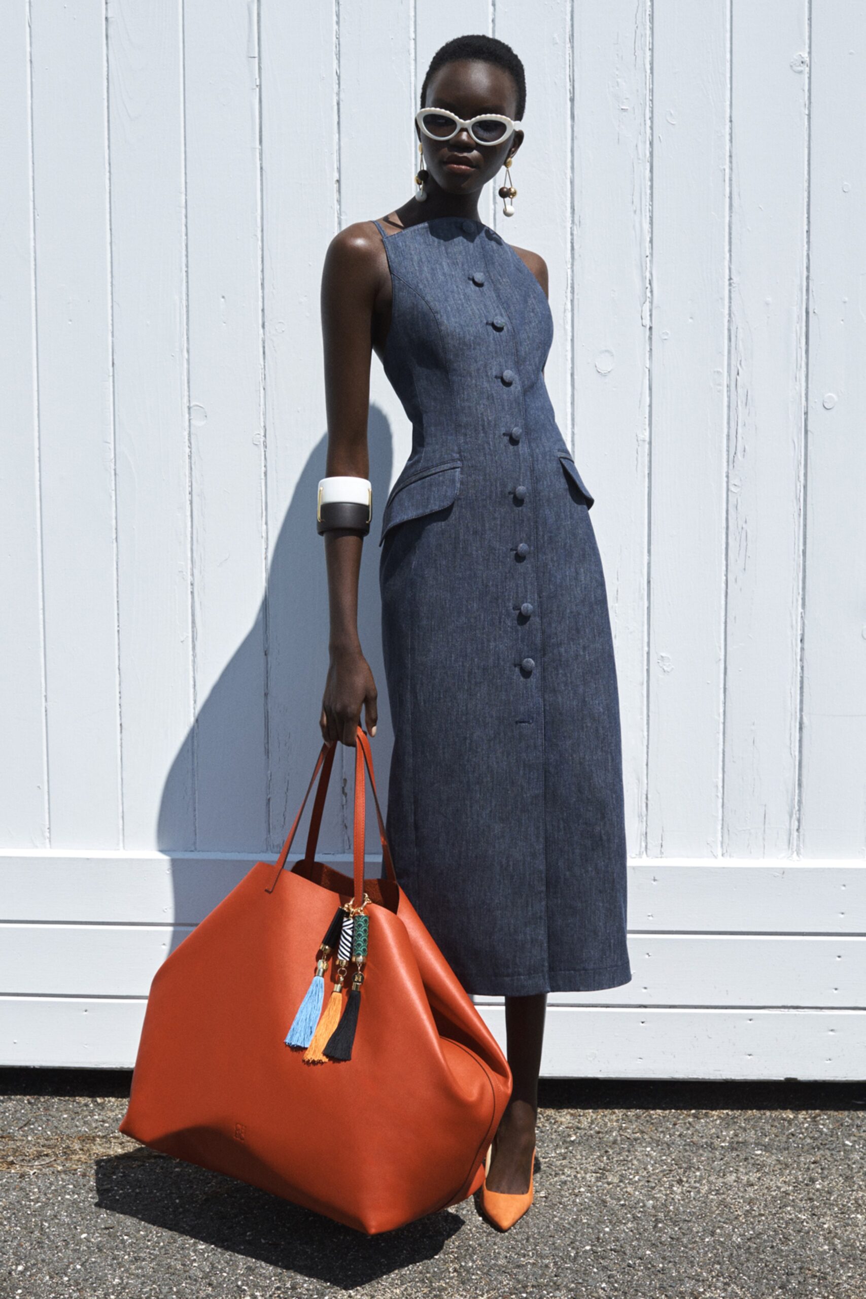 blue denim sleeveless high-neck fitted buttoned pockets midi-dress