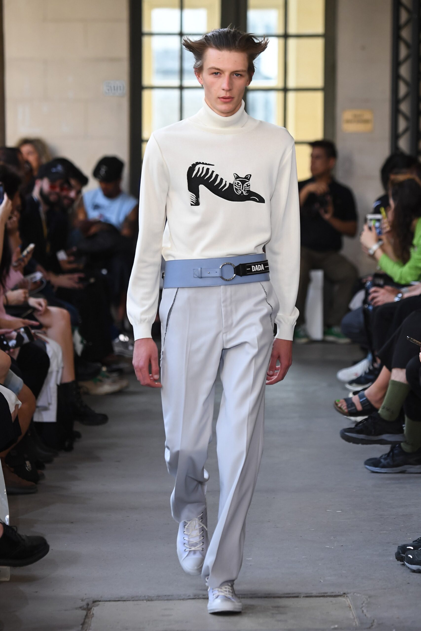 white turtleneck sweater with cat motif