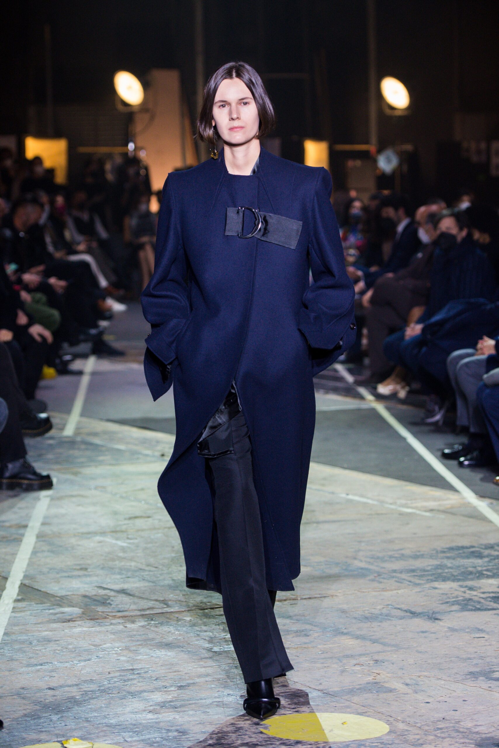 navy sculptural buckle-front coat